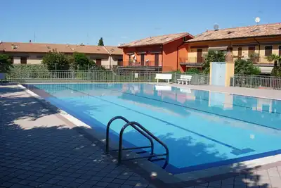 Image de Da Elena Apartment, two-room apartment with private garden, complex with pool and tennis court