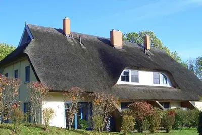 Image de Malve 3 Thatched-Roof House - Malve 3 Vacation Home – Thatched-Roof Vacation with a Fireplace and Wallbox