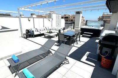 Image de Valentino Golf modern apartment featuring private roof terrace and hot tub