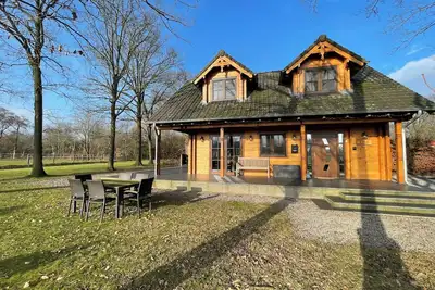 Image de 4-person holiday home on a small-scale holiday park with infrared sauna and beautiful views in a quiet area