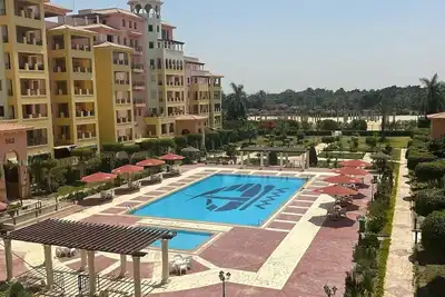 Image de Modern 2-bedroom Apt | Dreamland Golf & Pool View