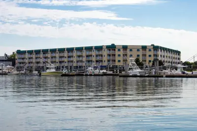 Image de 111 Bay Creek Villa | 1st Floor Villa | Panoramic Creek, River & Marina Views | Communal Pool