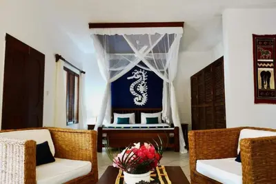 Image de 5 minutes walk to the beach, at the center of Diani, 1 & 2 bedroomed cottages