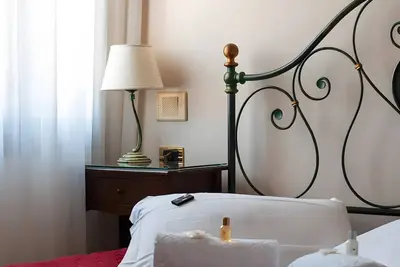 Image de Chambre « Villa Goetzen - Quadruple » avec Wi-Fi et climatisation