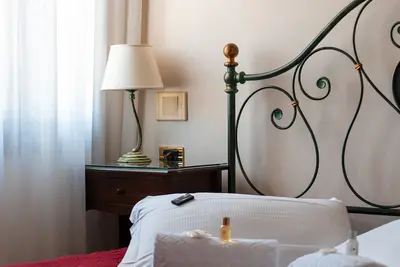 Image de Chambre « Villa Goetzen - Quadruple » avec Wi-Fi et climatisation