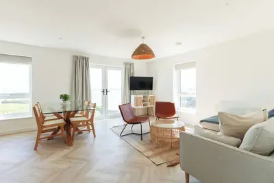 Image de A modern costal apartment in the scenic Bull Bay, offering stunning coastal views for up to 4 guests