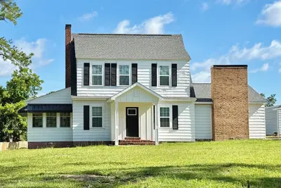 Image de The Country Farmhouse offers five bedrooms and is located in peaceful location.
