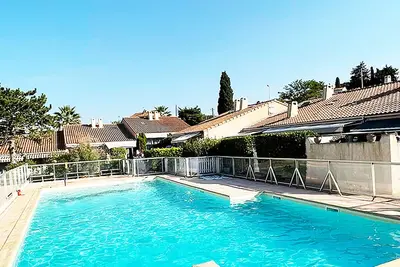 Image de Duplex mezzanine lumineux · Piscine · 5 min plage à pied · Terrasse privée
