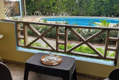 Image de Serene Blue Sea Escape. Pool & 8-Min Walk to Beach