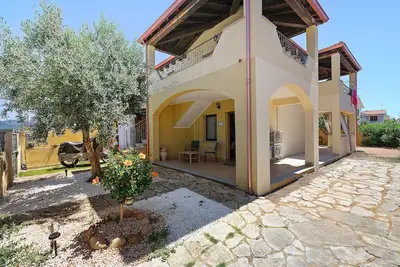 Image de Maison de vacances 'Casa Vacanze Domu A Mari' avec climatisation