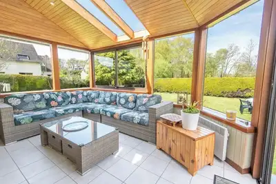 Image de Maison familiale avec veranda et grand jardin à 7 min des plages par Groom*