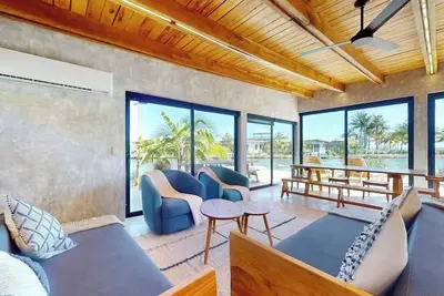 Image de Tranquil bay-view villa with private plunge pool, open layout & breezy deck