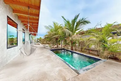 Image de Relaxing villa with private plunge pool, canal views & open layout for families
