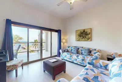 Image de Serene oceanfront condo with shared pool, ocean view, WiFi, & partial Ac