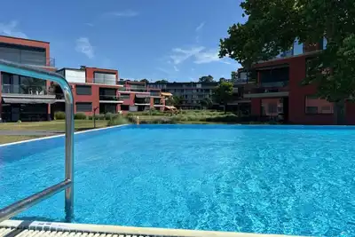Image de Appartement de vacances directement au bord de l'eau avec plage privée, Wi-Fi et climatisation