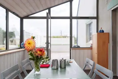 Image de Maison de vacances « Gîte Ty Véranda » avec terrasse privée et jardin commun