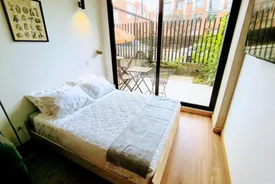 Image de Loft with a private garden and coworking space near Corferias and the U. S. Embassy