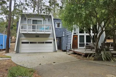 Image de The property combines privacy, charm, and modern updates.