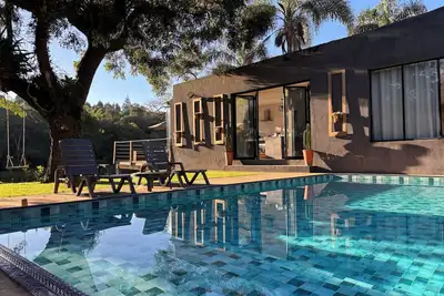 Image de Swimming pool, fireplace, complete leisure area with barbecue in Ibiúna, 1 hour from São Paulo.