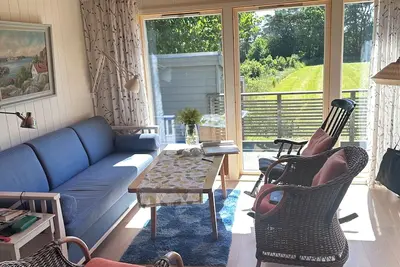 Image de A large cabin on the outskirts of Tromøya, with Raet National Park as its closest neighbor.