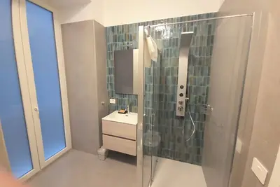 Image de Spacious 4-bedroom apartment in gorgeous Napoli with Ac, near the beach and sea.