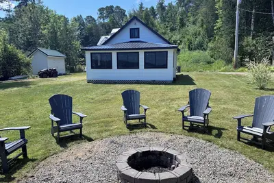 Image de Book your stay to find out why this Maine “camp” is a generational favorite!