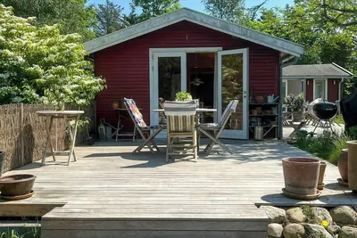 Image de Maison en bois avec jardin clos et grande terrasse à Vejby