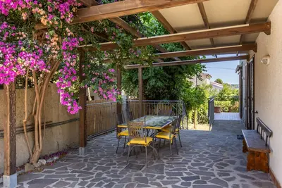 Image de Appartement « Cala Di Forno à Talamone » avec terrasse privée, jardin privé et Wi-Fi
