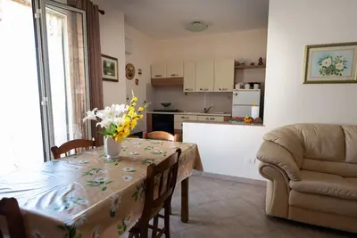 Image de Cozy apartment of about 90 sqm, able to accommodate up to 4 guests, located on the first floor of a modern building with an elevator. The property is situated in a residential area of ​​Pozzallo—a seaside town whose beaches have repeatedly been awa