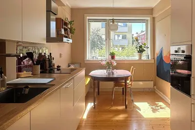 Image de Appartement avec cheminée et charme vintage à Sagene