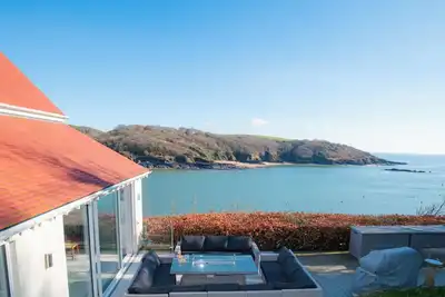 Image de Vues luxueuses sur estuaire & parking | Cottage Woodcot