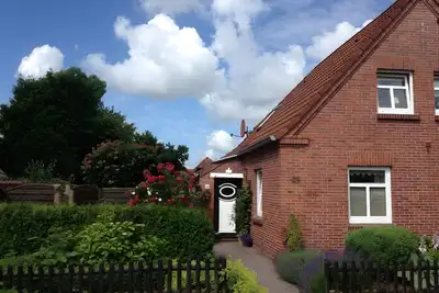 Image de Maison de vacances « Dat Lüttje Huus 2 » avec terrasse, jardin privés et Wi-Fi