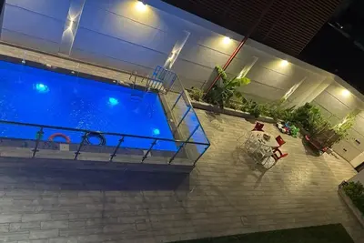 Image de Fabulous 3-bedroom chalet and villa with swimming pools in vibrant Jeddah