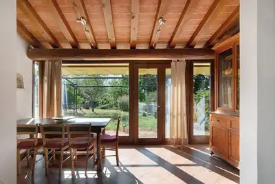 Image de Appartement 'Villa Il Rossignolo - Jardin Privé', Piscine et Terrasse Partagées, Wi-Fi
