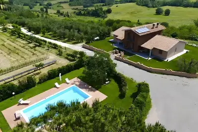 Image de Appartement 'PoggioNovello-nord' avec piscine privée, Wi-Fi et climatisation