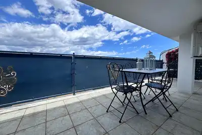 Image de Sardinia. Cozy apartment in the city center, with a balcony offering a panoramic view. Sleeps 6.