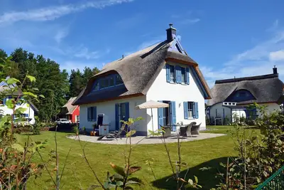 Image de Maison de vacances avec cheminée et sauna, à environ 600 mètres de la plage de sable ; animaux acceptés