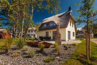 Image de Maison avec cheminée et sauna, à environ 500 m d’une plage de sable, 4 chambres, jusqu’à 8 couchages, Wi-Fi