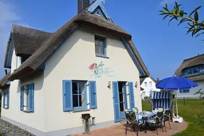 Image de Maison de vacances avec cheminée, à environ 400 mètres de la plage de sable, Wi-Fi, chiens acceptés