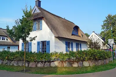 Image de Maison de vacances avec cheminée et sauna, à environ 500 mètres de la plage de sable ; chiens acceptés