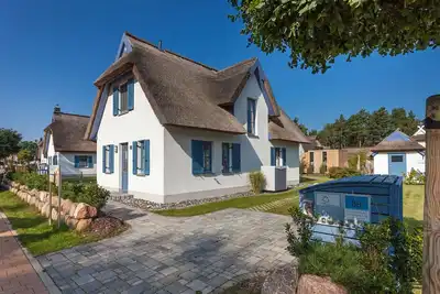 Image de Maison de vacances avec cheminée et sauna, à environ 500 mètres de la plage de sable ; chiens acceptés