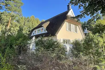 Image de Maison de vacances avec cheminée, à environ 800 mètres de la plage de sable, avec machine à laver et Wi-Fi