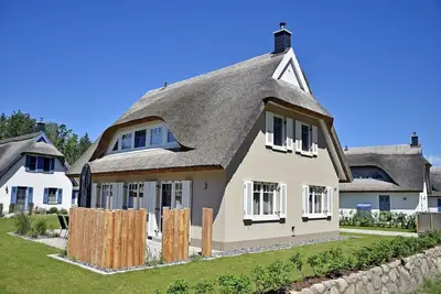 Image de Maison de vacances avec cheminée et sauna, à environ 450 mètres de la plage de sable ; 1 animal accepté