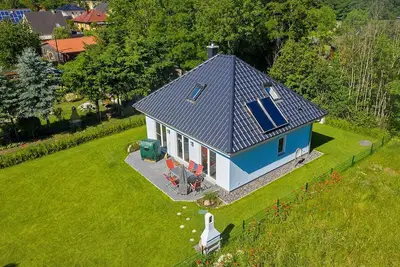 Image de Maison de vacances avec cheminée, à environ 800 mètres de la plage de sable, avec Wi-Fi et machine à laver