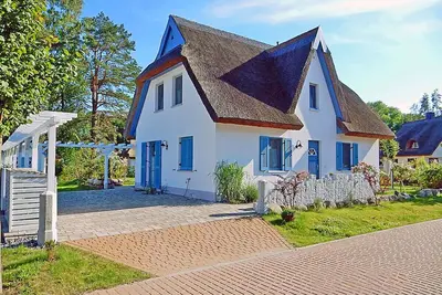 Image de Maison de vacances avec cheminée et sauna, à environ 500 mètres de la plage de sable, Wi-Fi, machine à laver