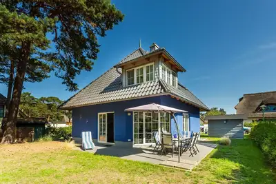 Image de Maison de vacances avec cheminée, à environ 200 mètres de la plage de sable, Wi-Fi, machine à laver, sèche-linge