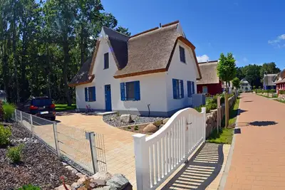 Image de Maison de vacances avec cheminée et sauna, à environ 500 mètres de la plage de sable ; animaux acceptés