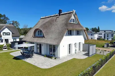 Image de Maison avec cheminée et sauna, à environ 1 300 m d’une plage de sable, 4 chambres, jusqu’à 8 personnes, Wi-Fi