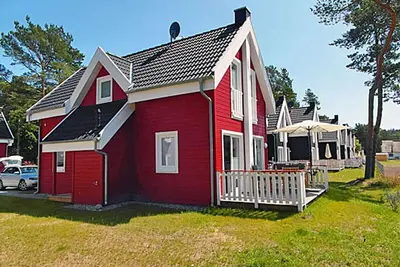 Image de Maison de vacances avec cheminée, à environ 800 mètres de la plage de sable, Wi-Fi, chiens acceptés