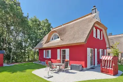 Image de Maison de vacances avec cheminée et sauna, à environ 400 mètres de la plage de sable, Wi-Fi, machine à laver